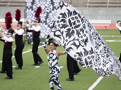 Band and Flag Corp performing at halftime 